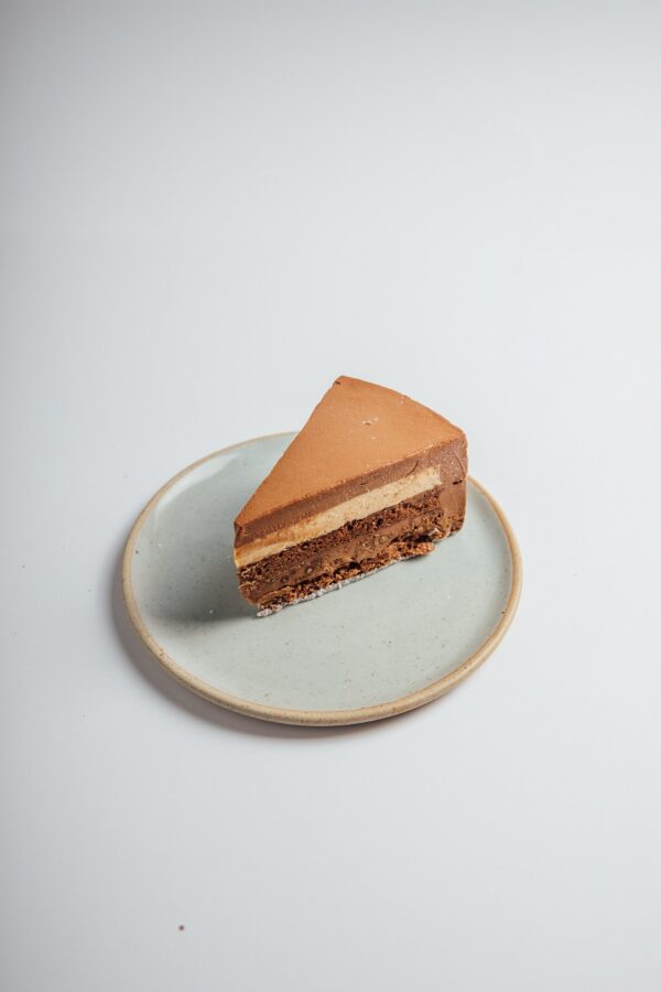 Dark Chocolate Almond cake slice served on a plate