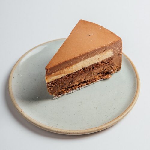 Dark Chocolate Almond cake slice served on a plate