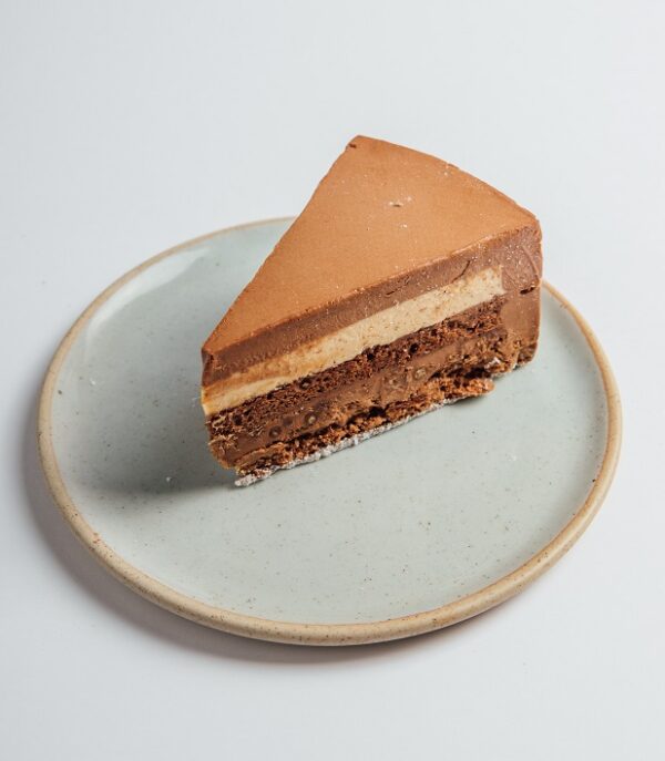 Dark Chocolate Almond cake slice served on a plate