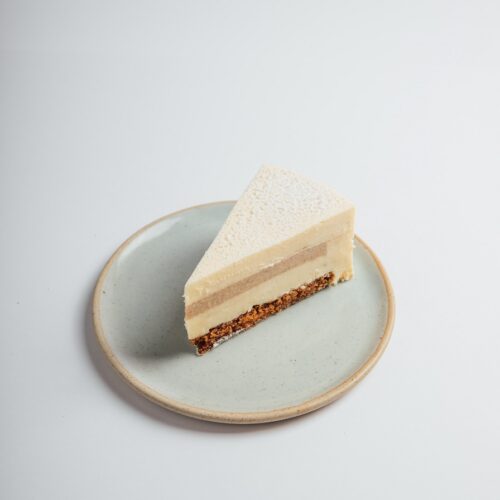 Carrot Cheesecake slice served on a plate