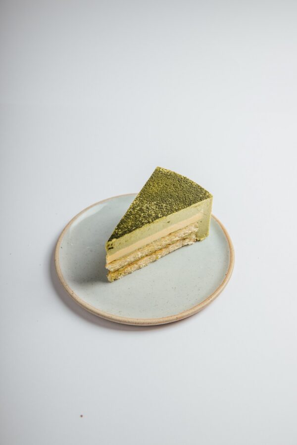 Matcha Yuzu cake slice served on a plate