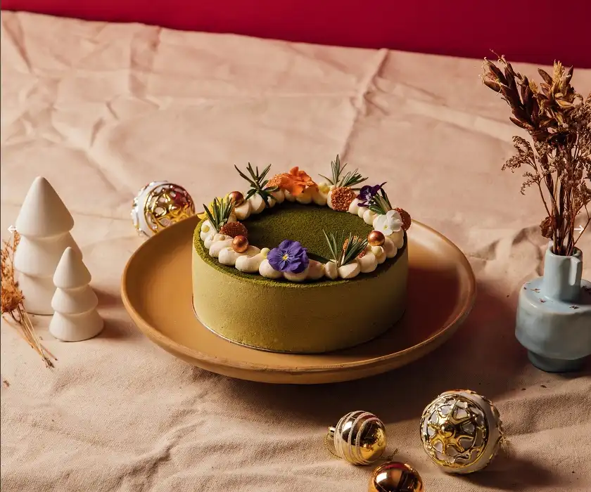 Matcha yuzu cake with floral decorations